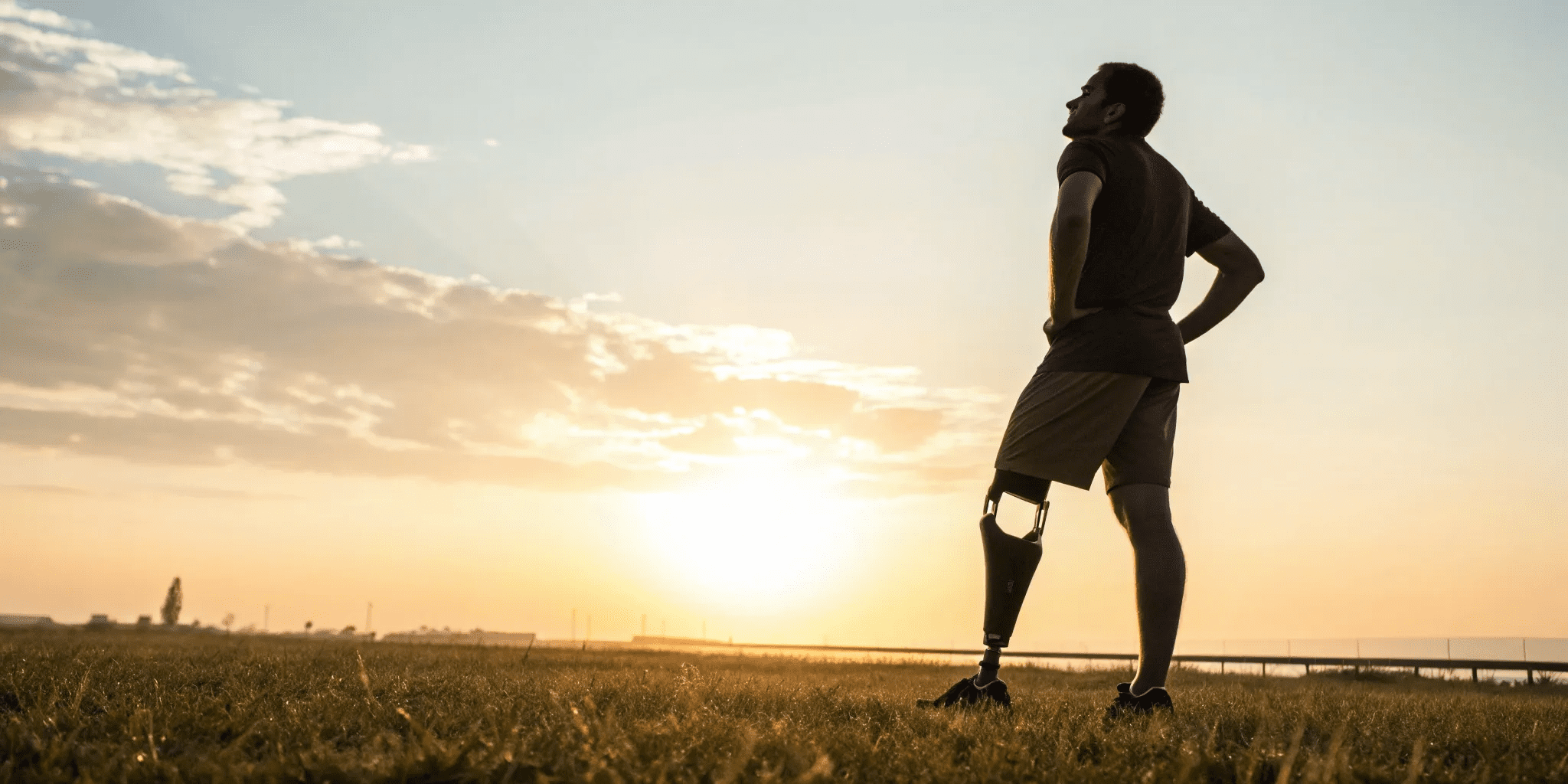 Your Guide to a Successful 2nd ACL Surgery Recovery 1 Man on a field at dawn, focused on his successful 2nd ACL surgery recovery.